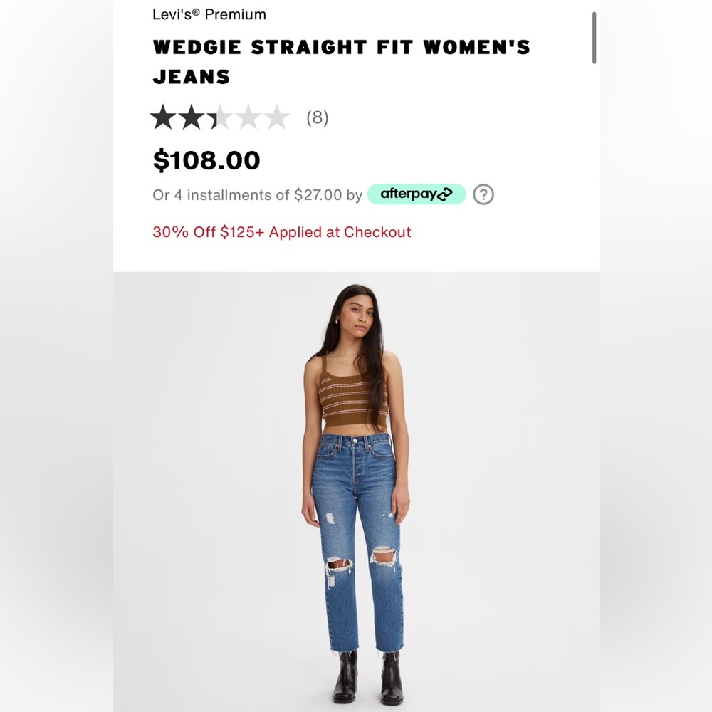 Levi Wedgie Straight Denim. Frayed at bottom